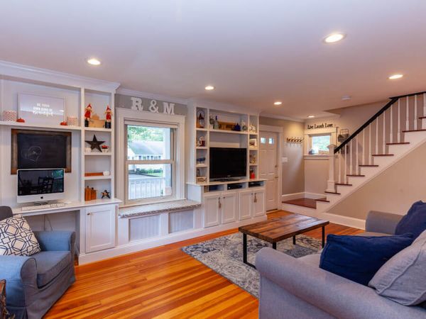 home remodeling - living room, custom stairs, and furniture